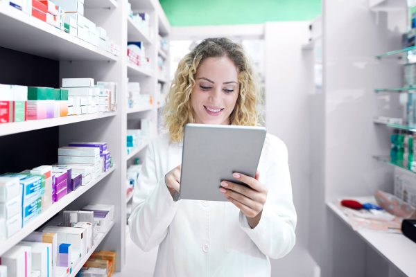 female-pharmacist-working-drug-store